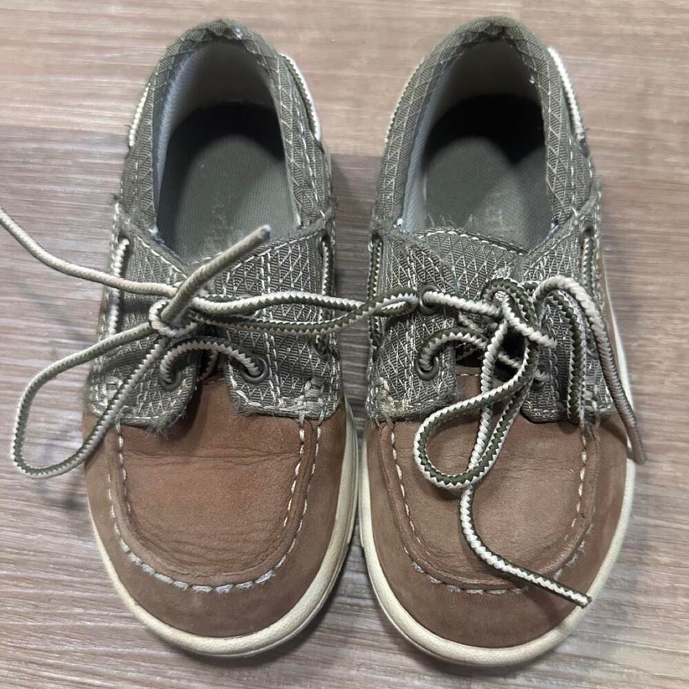 Brown olive green boat